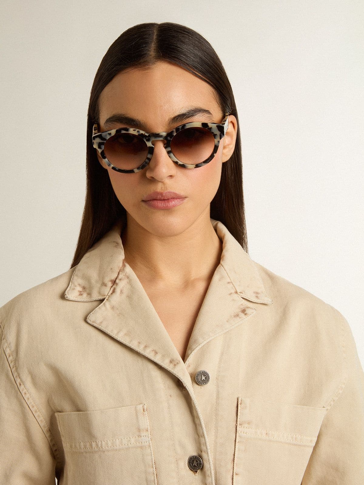 Cameron-style sunglasses with a tortoiseshell pattern