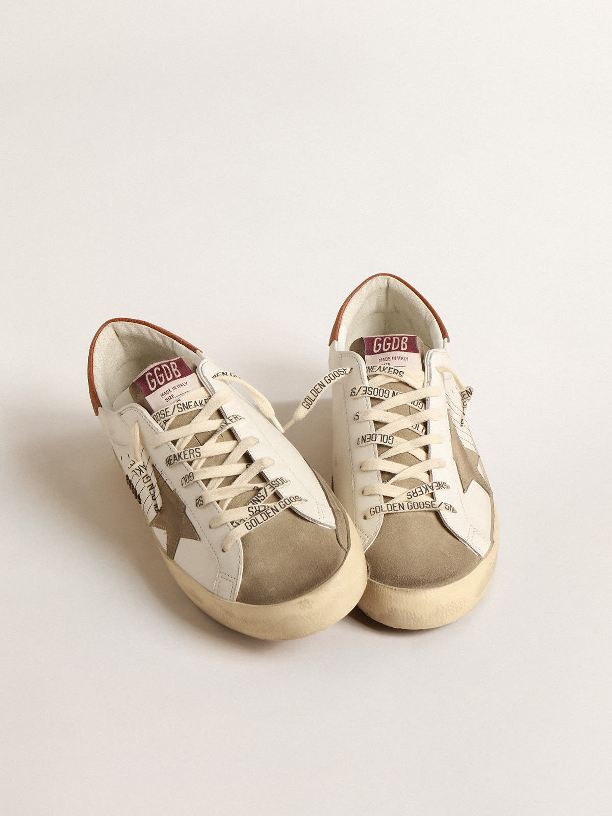 Super-Star con stella in suede e talloncino in pelle marrone