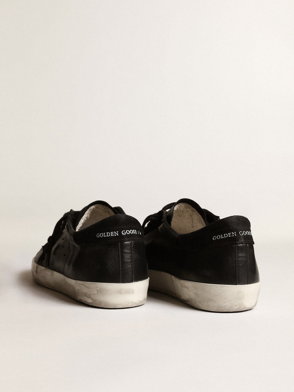 Super-Star in nappa nera con stella e talloncino in suede nero