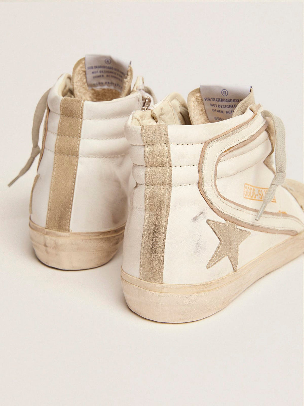 Sneaker Slide con stella in suede grigio ghiaccio e virgola in pelle bianca
