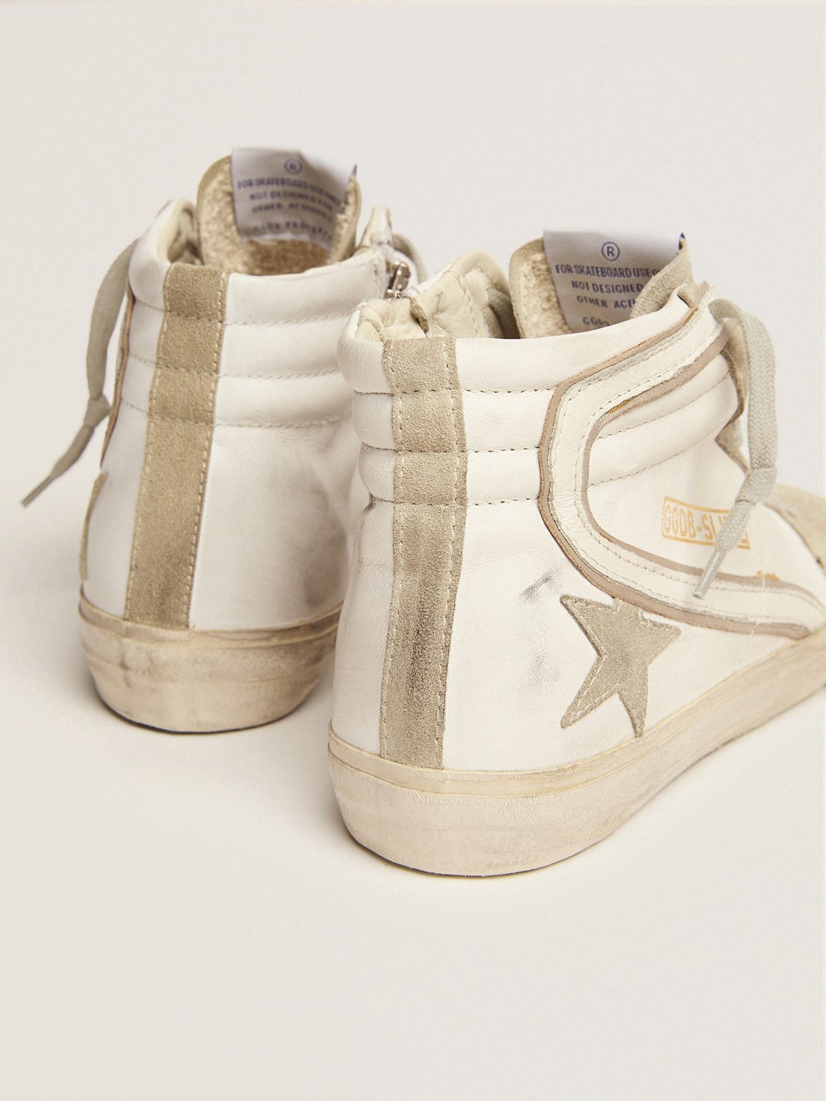 Sneaker Slide con stella in suede grigio ghiaccio e virgola in pelle bianca