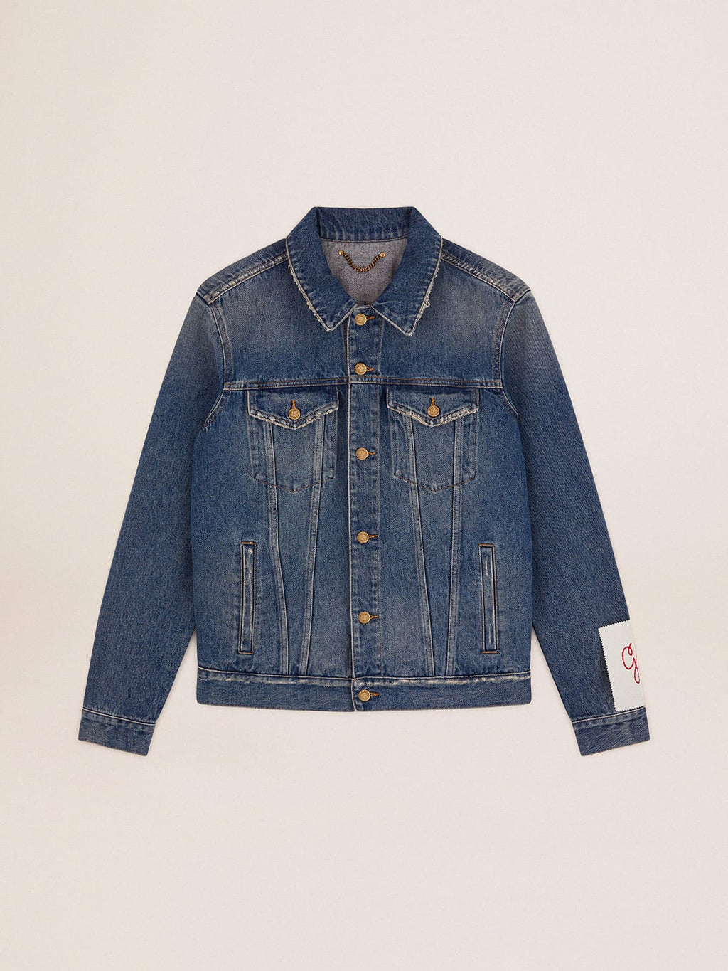 Giacca in jeans lavaggio medio e trattamento distressed