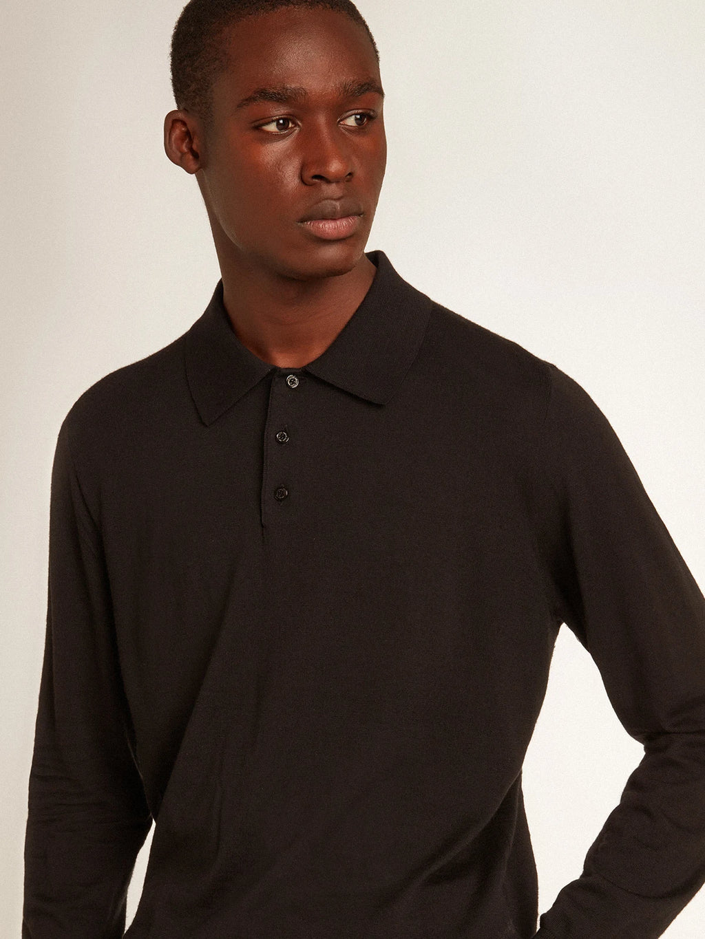 Polo maniche lunghe da uomo in lana merino di colore nero
