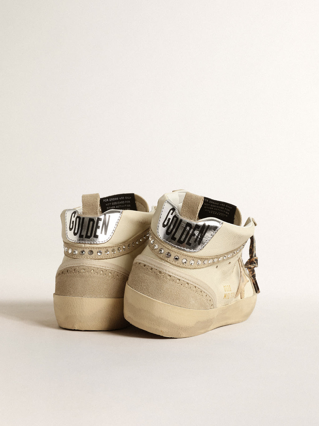 Mid Star con stella in pelle laminata e virgola con cristalli
