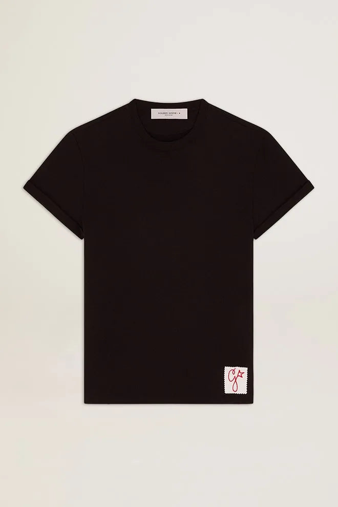 T-shirt Collezione Golden di colore nero vintage dal trattamento distressed