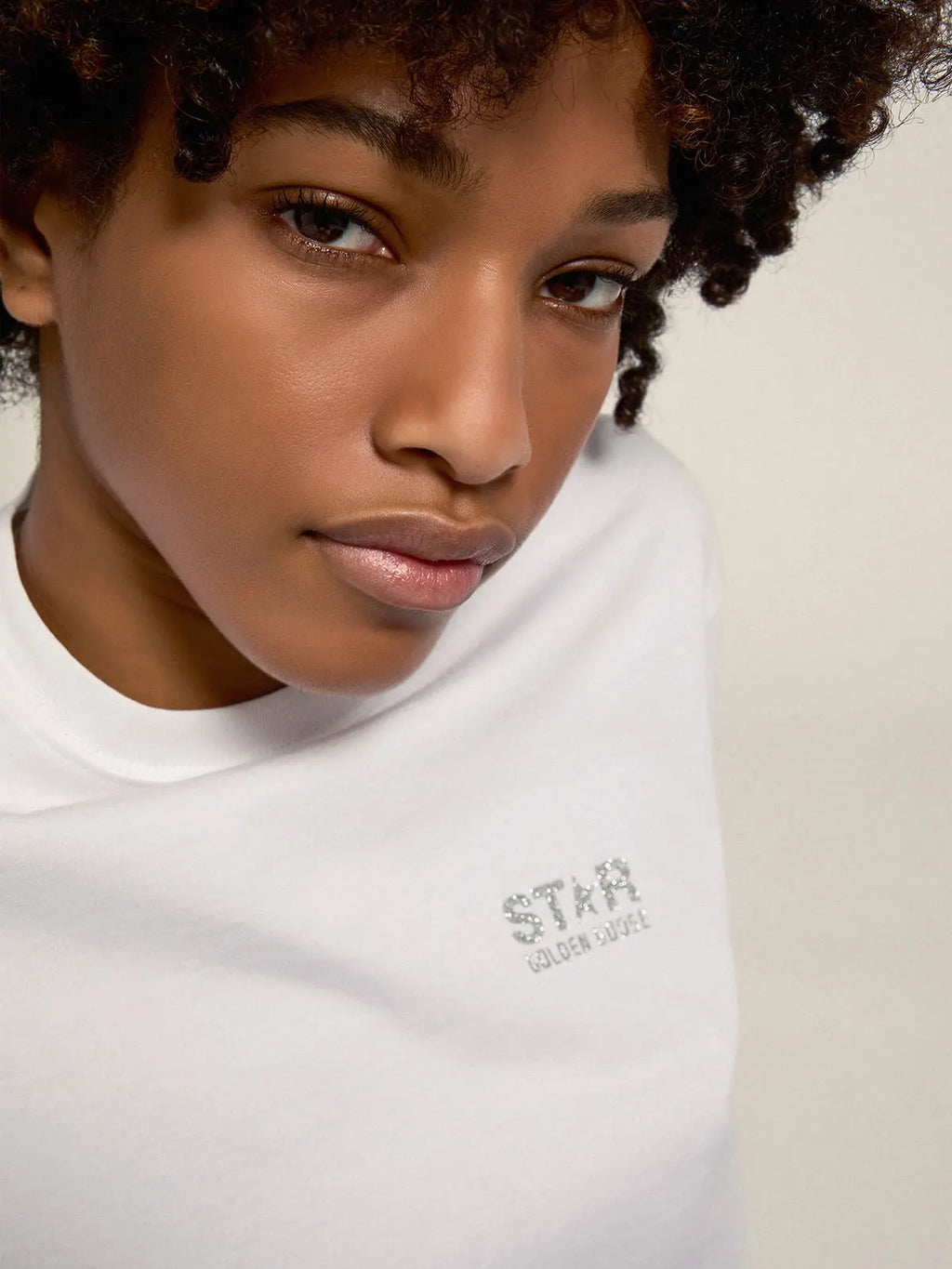 T-shirt bianca Collezione Star con logo e stella in glitter argento