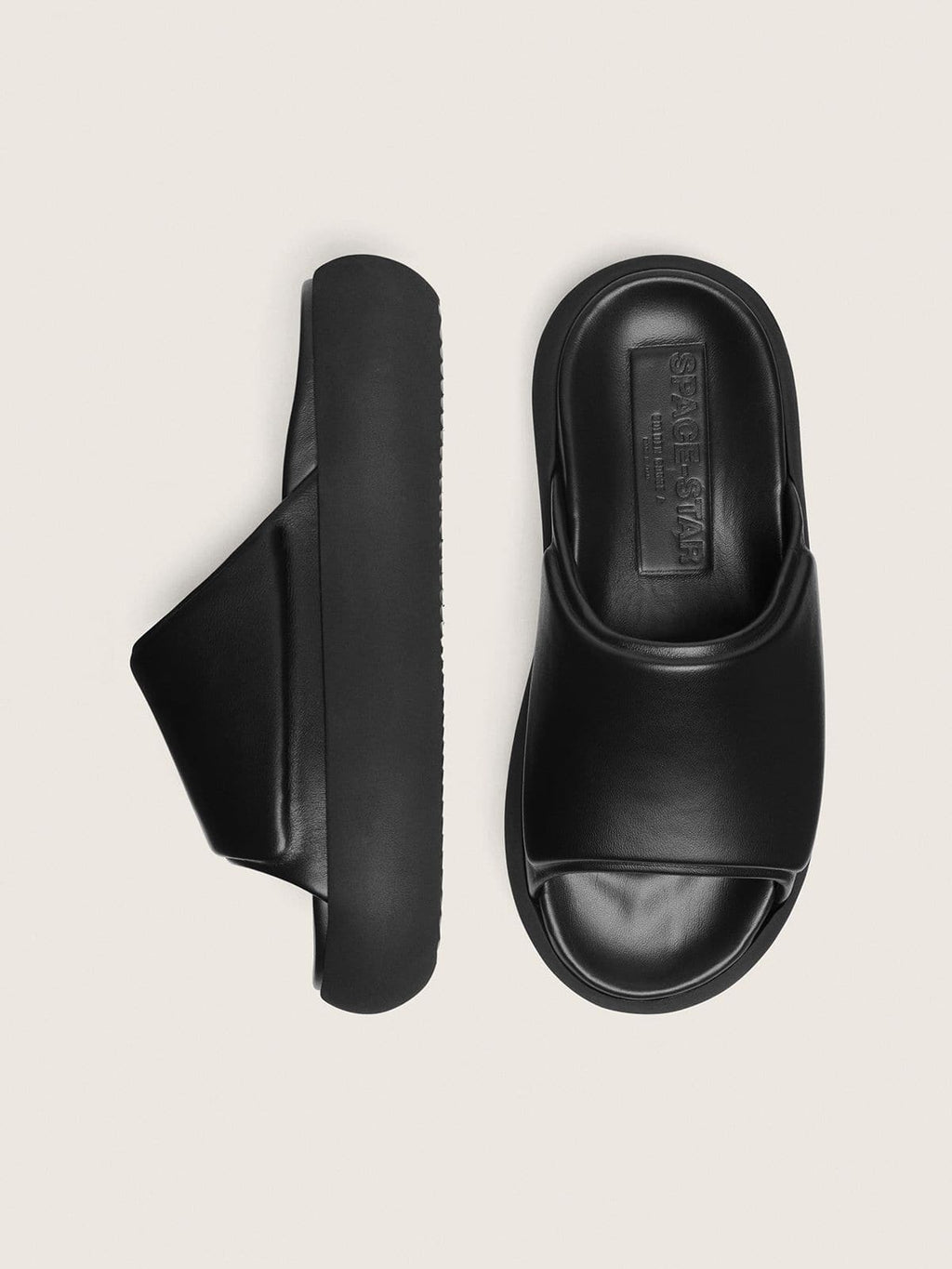 Men's Space-Star Slide slip-ons in black leather