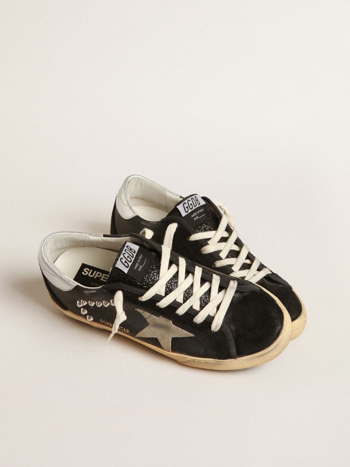Super-Star Donna in pelle e suede neri con borchie color argento