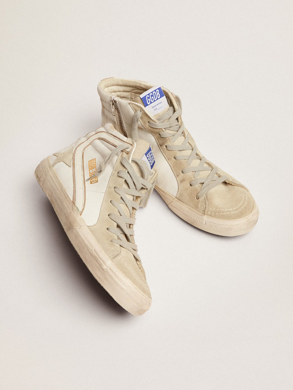 Sneakers Slide in pelle con stella e dettagli in camoscio