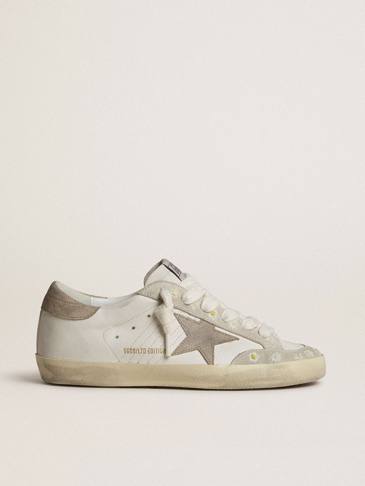 Women’s Super-Star LTD with beige suede star and heel tab and floral embroidery