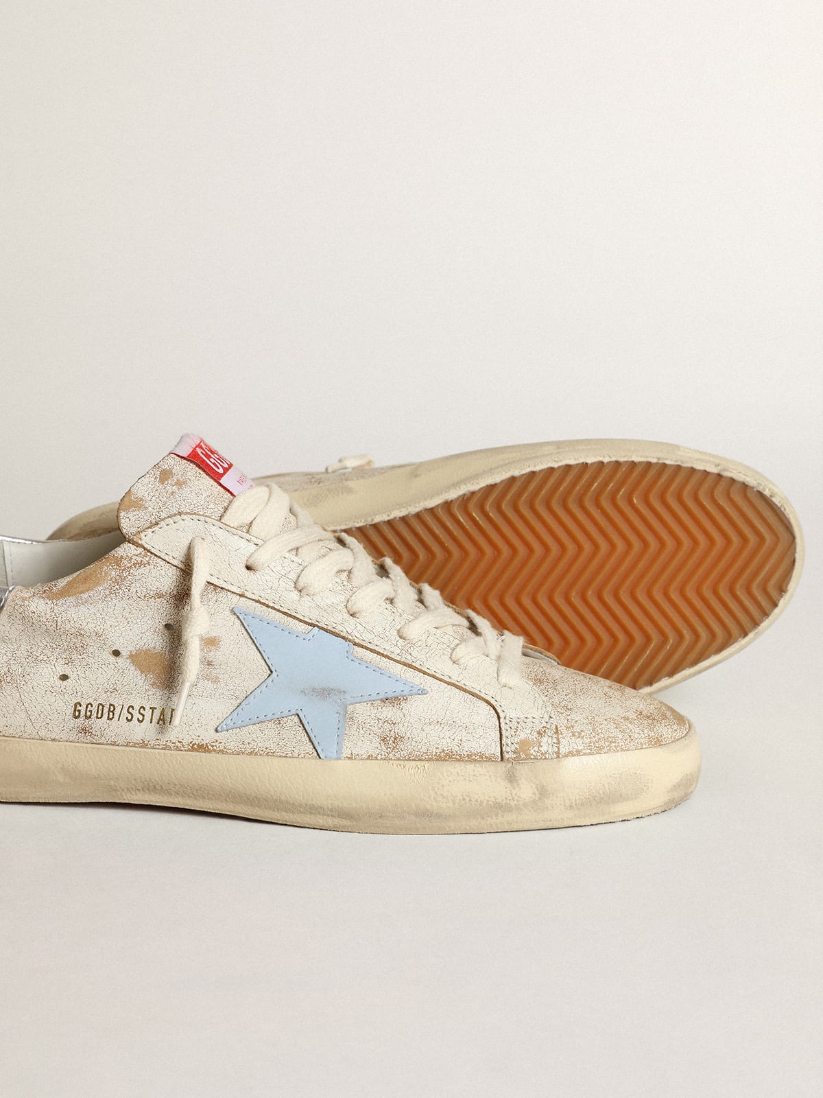 Sneaker Super-Star uomo con stella in pelle azzurro fumé e talloncino in pelle laminata color argento
