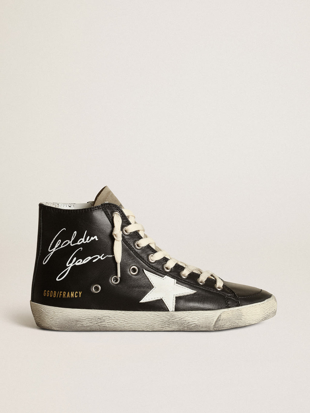 Sneaker Francy in nappa nera con stella in pelle bianca e linguetta in suede color tortora
