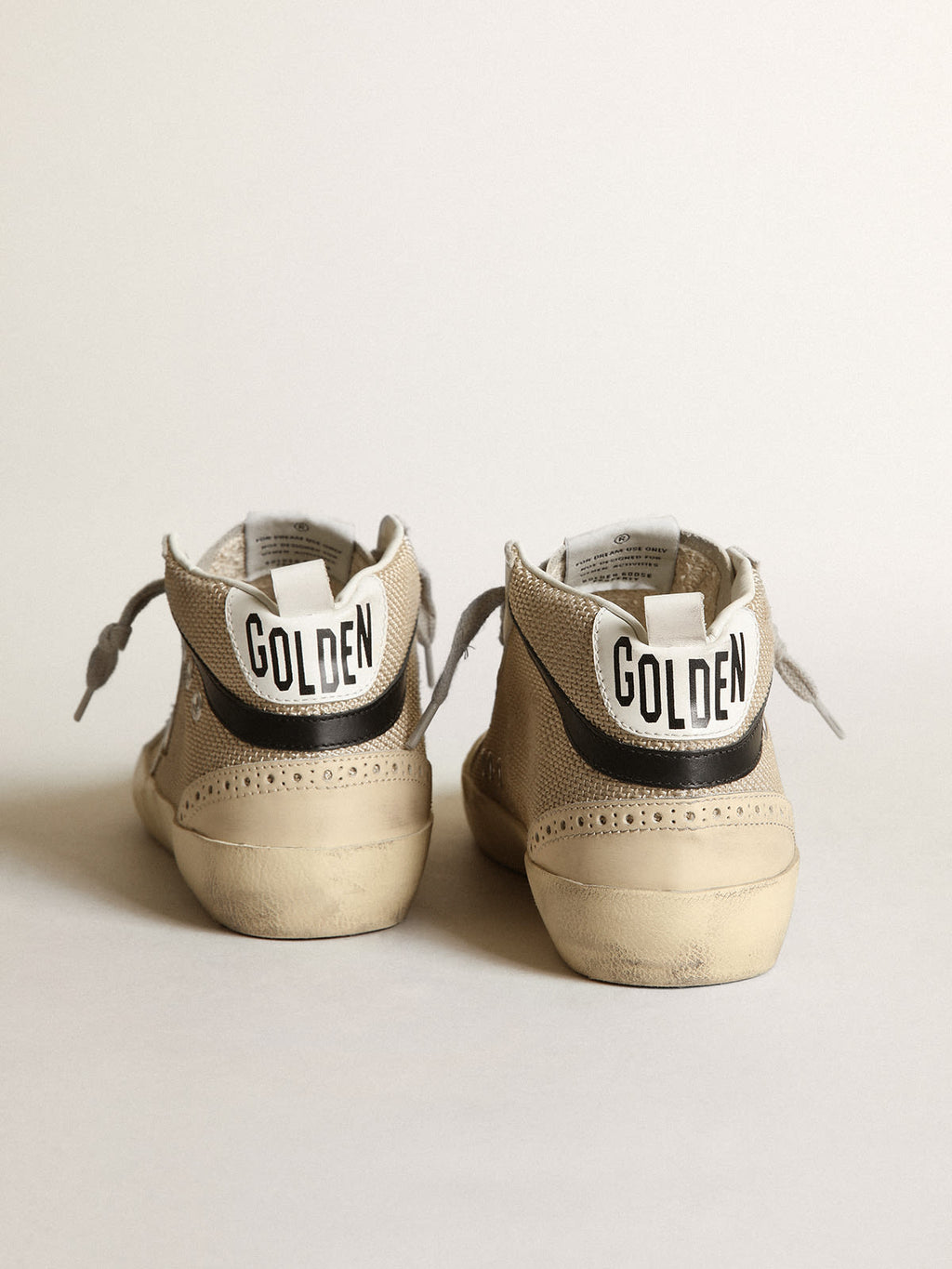Sneaker Mid Star LTD in rete color crema con stella in pelle laminata color argento e virgola in pelle nera