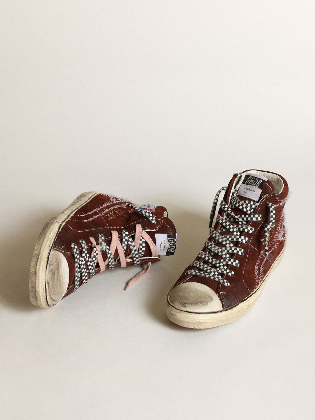 Sneaker Slide in suede color cioccolato con stella e virgola con impunture bianche