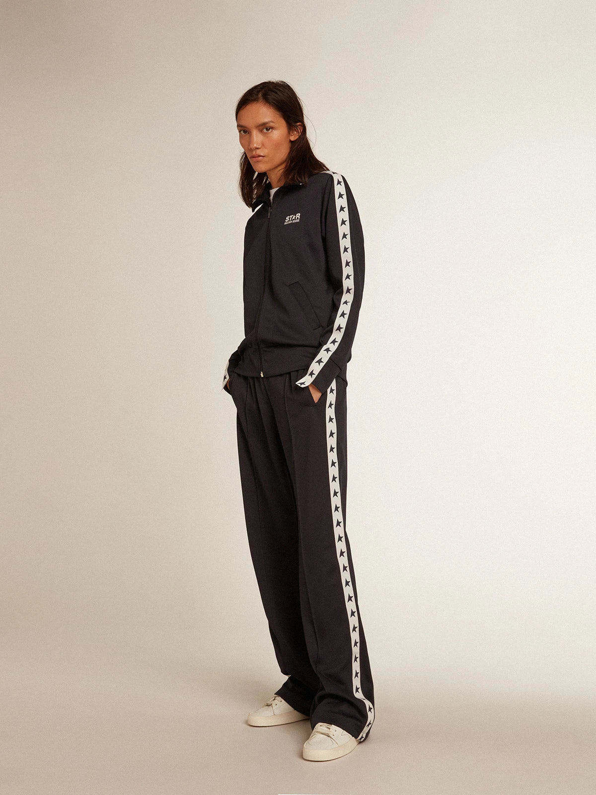 Pantalone jogging blu scuro con nastro bianco e stelle a contrasto
