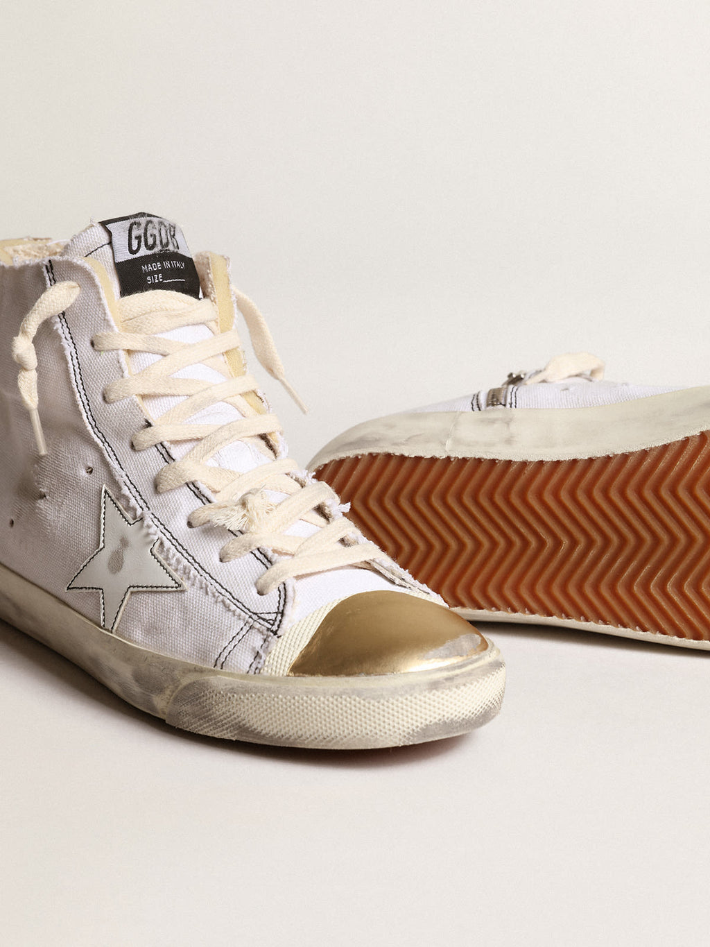 Sneaker Francy LAB con stella in pelle bianca e punta in pelle laminata color oro