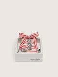 Skins "Playful" red and beige striped laces embellished with two charms