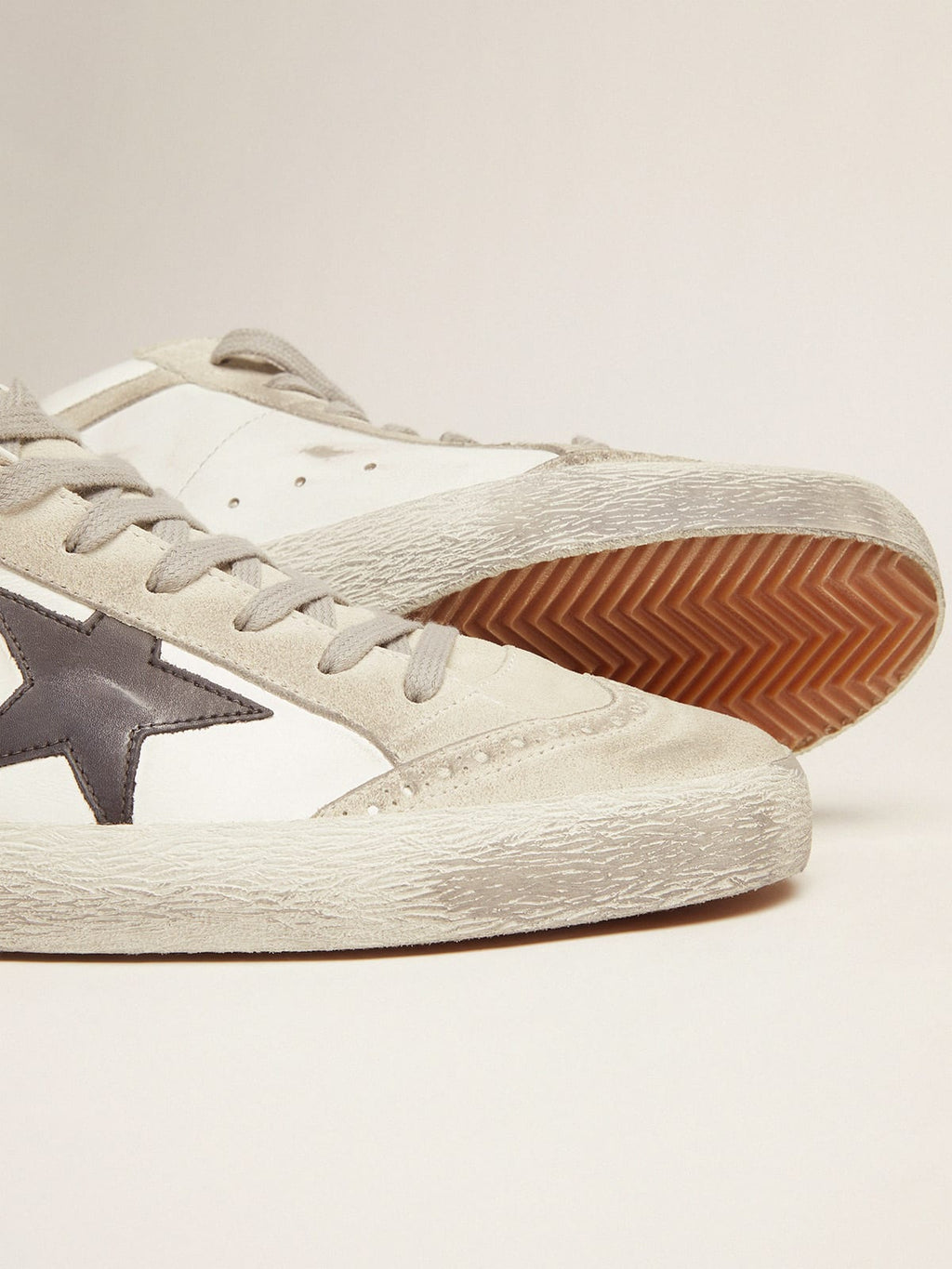 Sneakers Mid Star bianche e nere