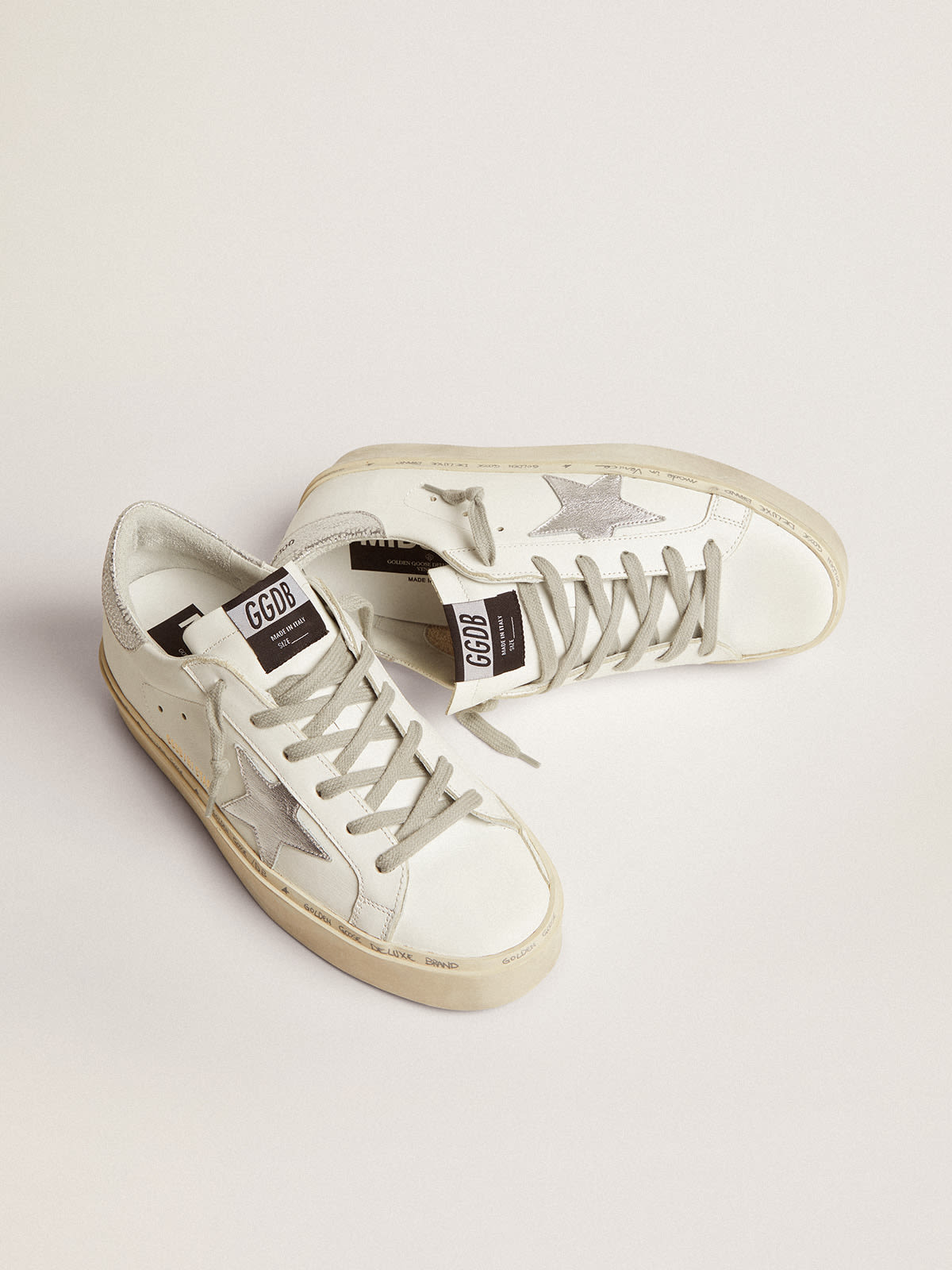 Sneakers Hi Star con stella e talloncino in argento metallizzato