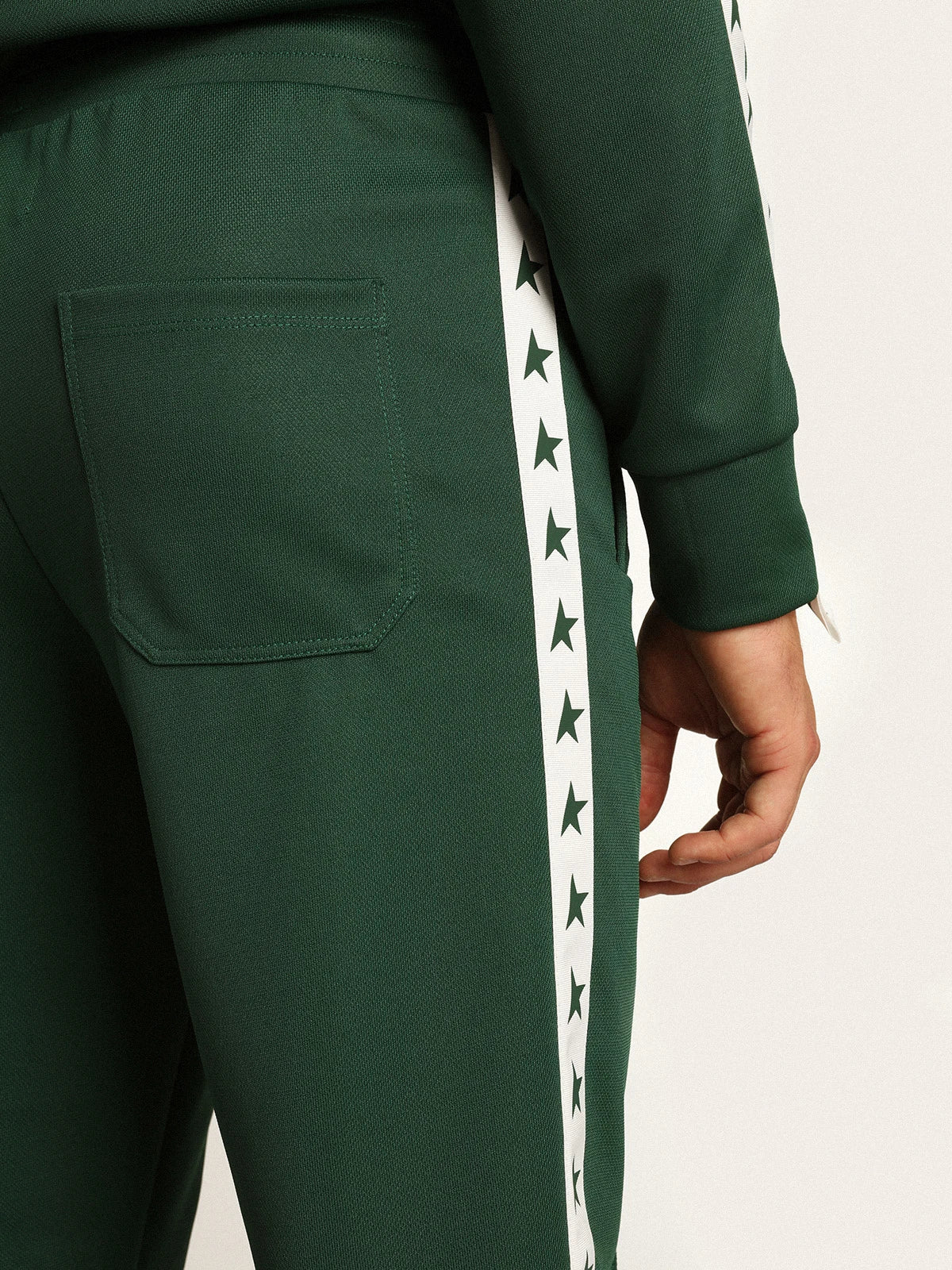 Pantalone jogging da uomo di colore verde con stelle sui lati