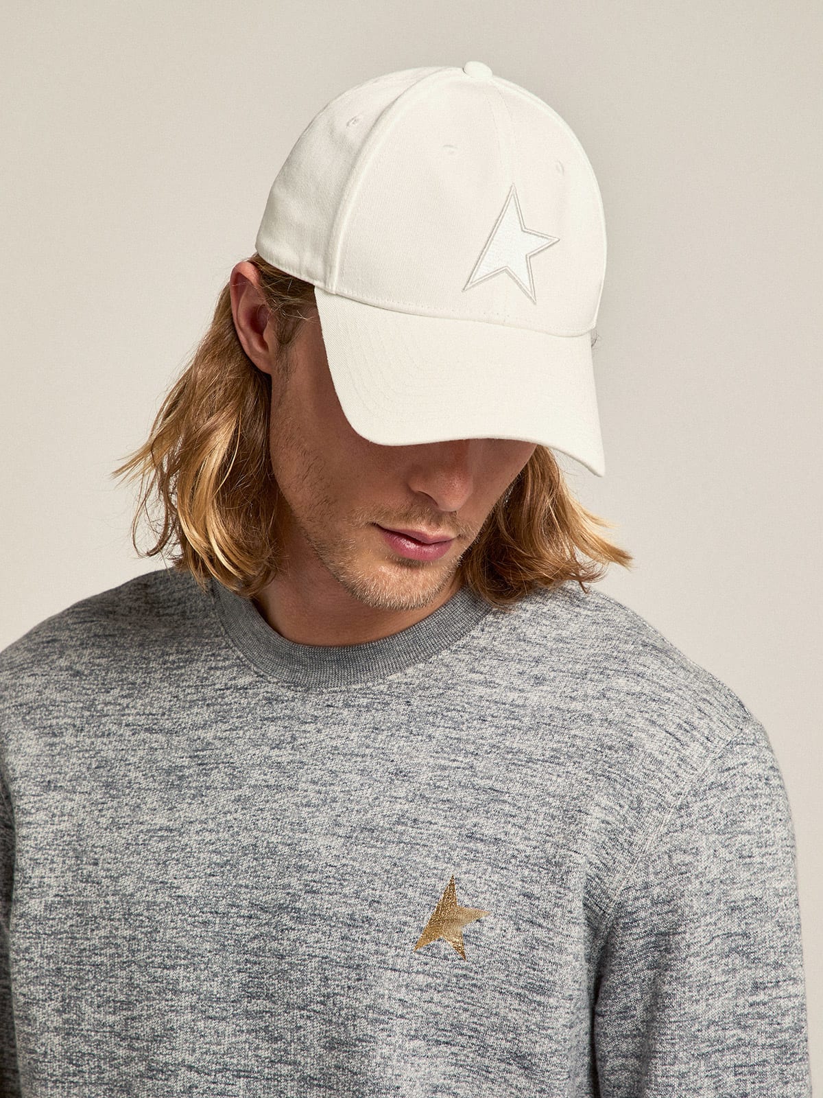 Cappellino da baseball di colore bianco papyrus con stella