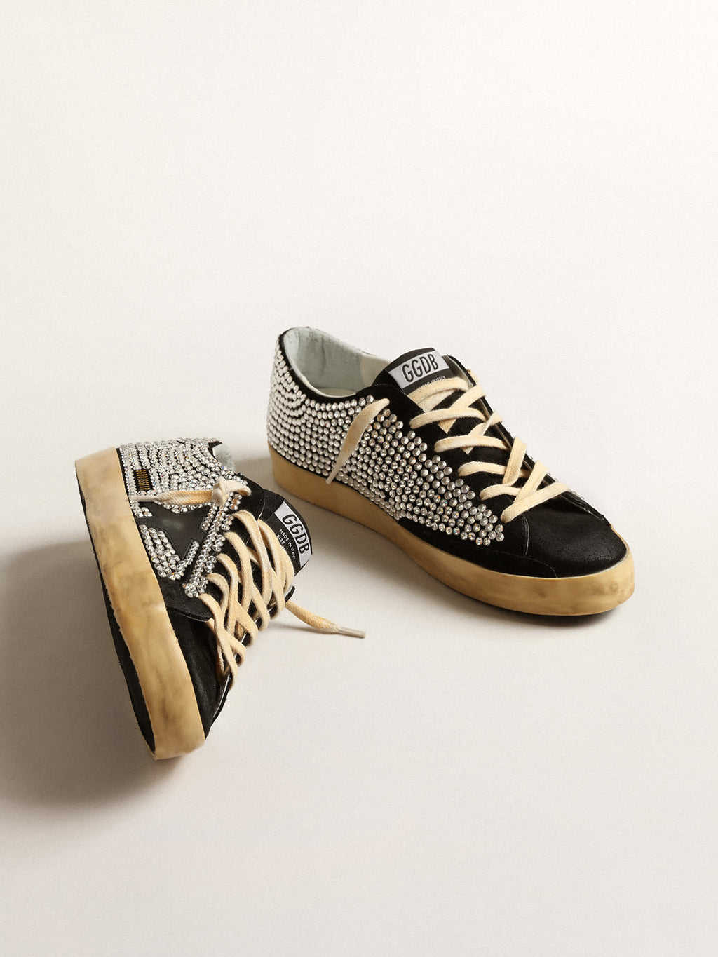 Super-Star LTD con cristalli Swarovski e stella in pelle nera
