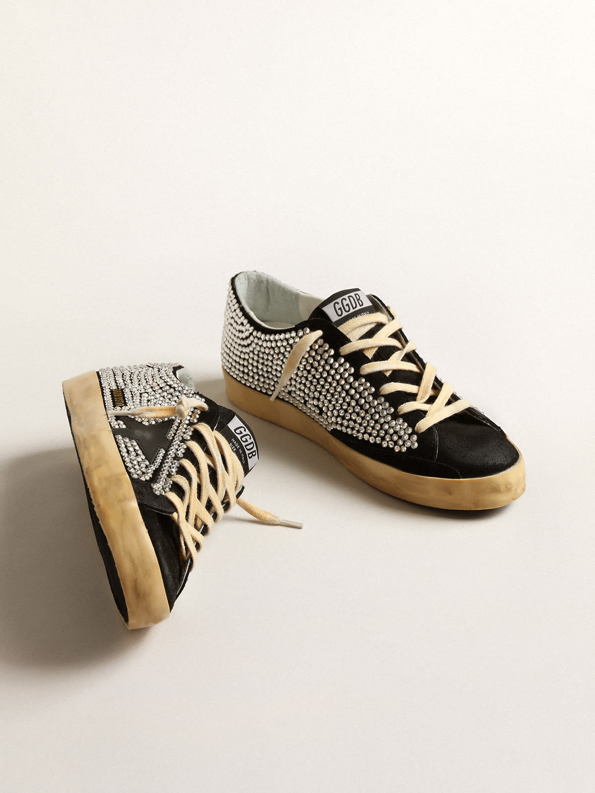 Super-Star LTD con cristalli Swarovski e stella in pelle nera