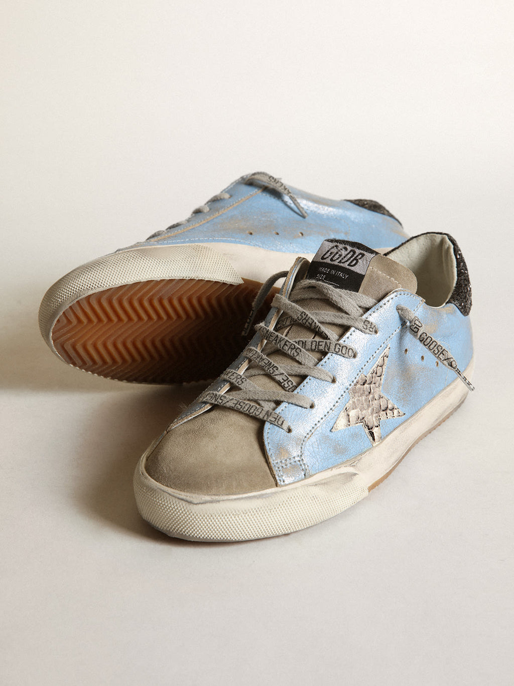 Super-Star azzurra con stella grigia e talloncino in glitter