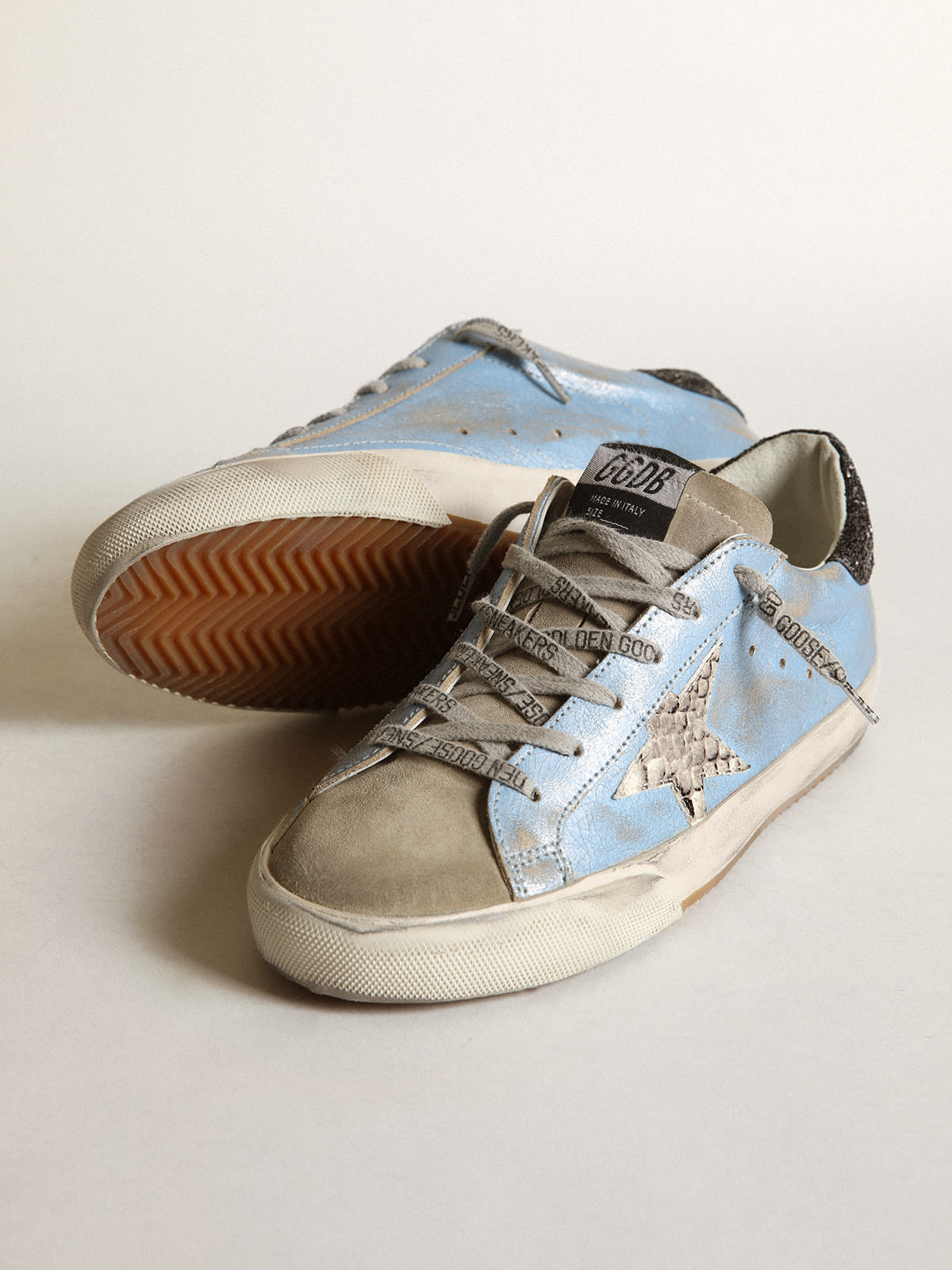 Super-Star azzurra con stella grigia e talloncino in glitter