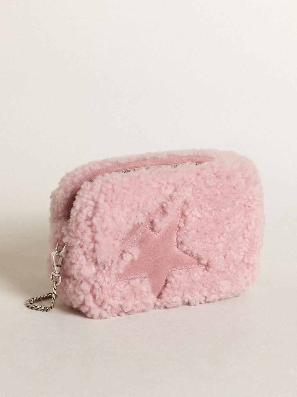 Borsa Mini Star Bag in shearling color rosa e con stella in suede