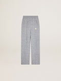 Pantalone jogging di colore grigio con stella dorata sul davanti