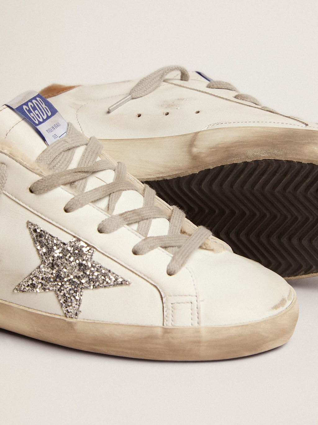 Sneaker Super-Star foderate in shearling con stella in glitter argento e talloncino in pelle con stampa lucertola color tortora