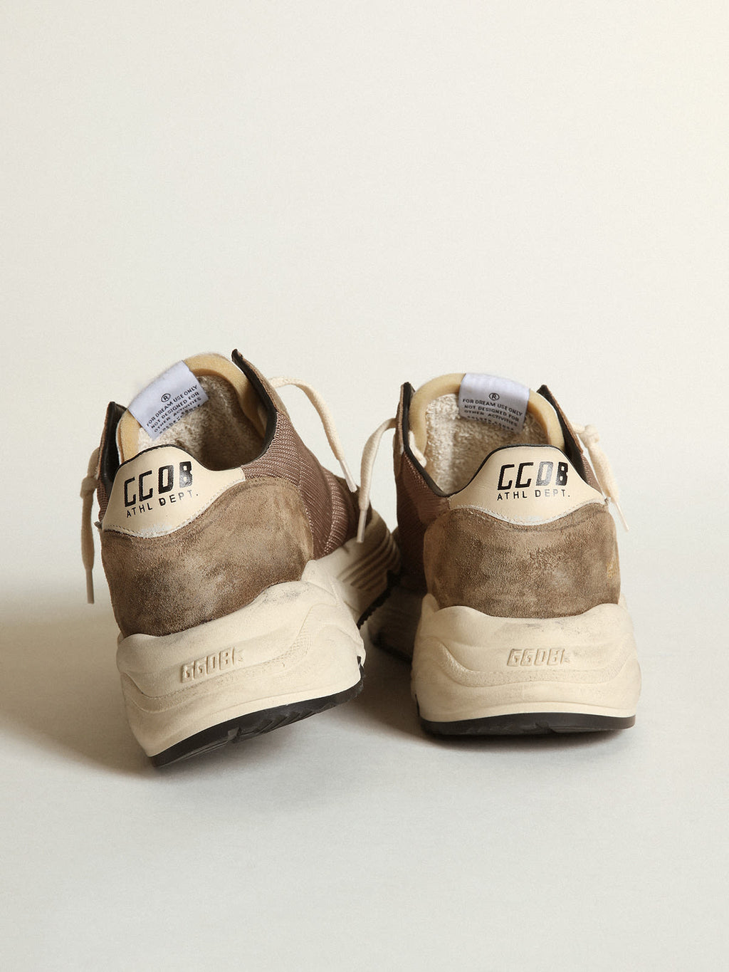 Sneaker Running Sole in rete e pelle color verde oliva con stella e talloncino in pelle color crema