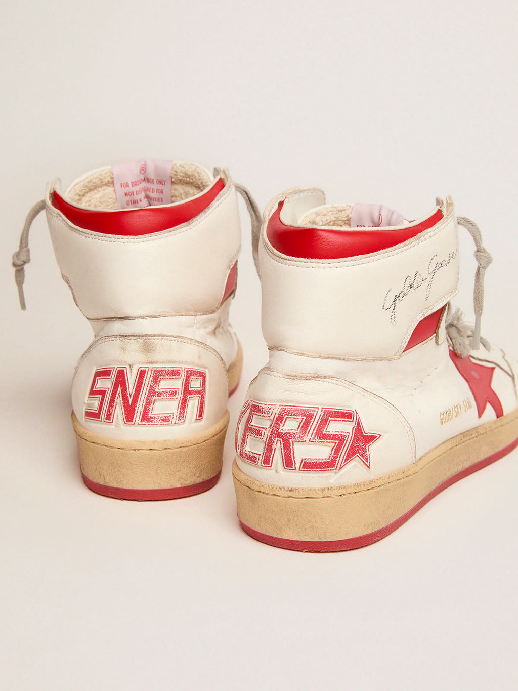Sneaker Sky-Star in nappa bianca con stella e talloncino in pelle rossa
