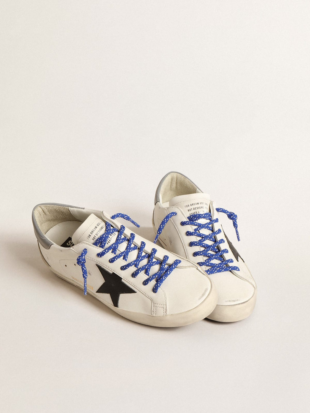 Super-Star LTD con stella in pelle nera e talloncino grigio