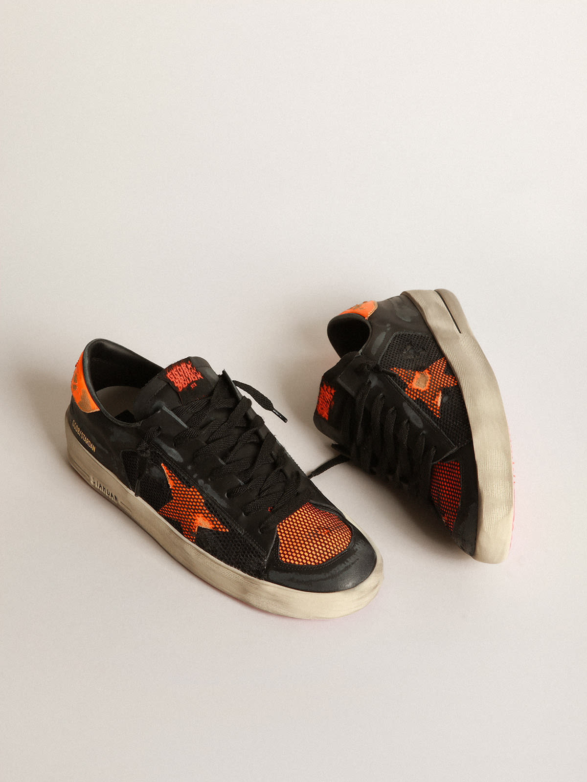 Sneakers Stardan nere e arancioni
