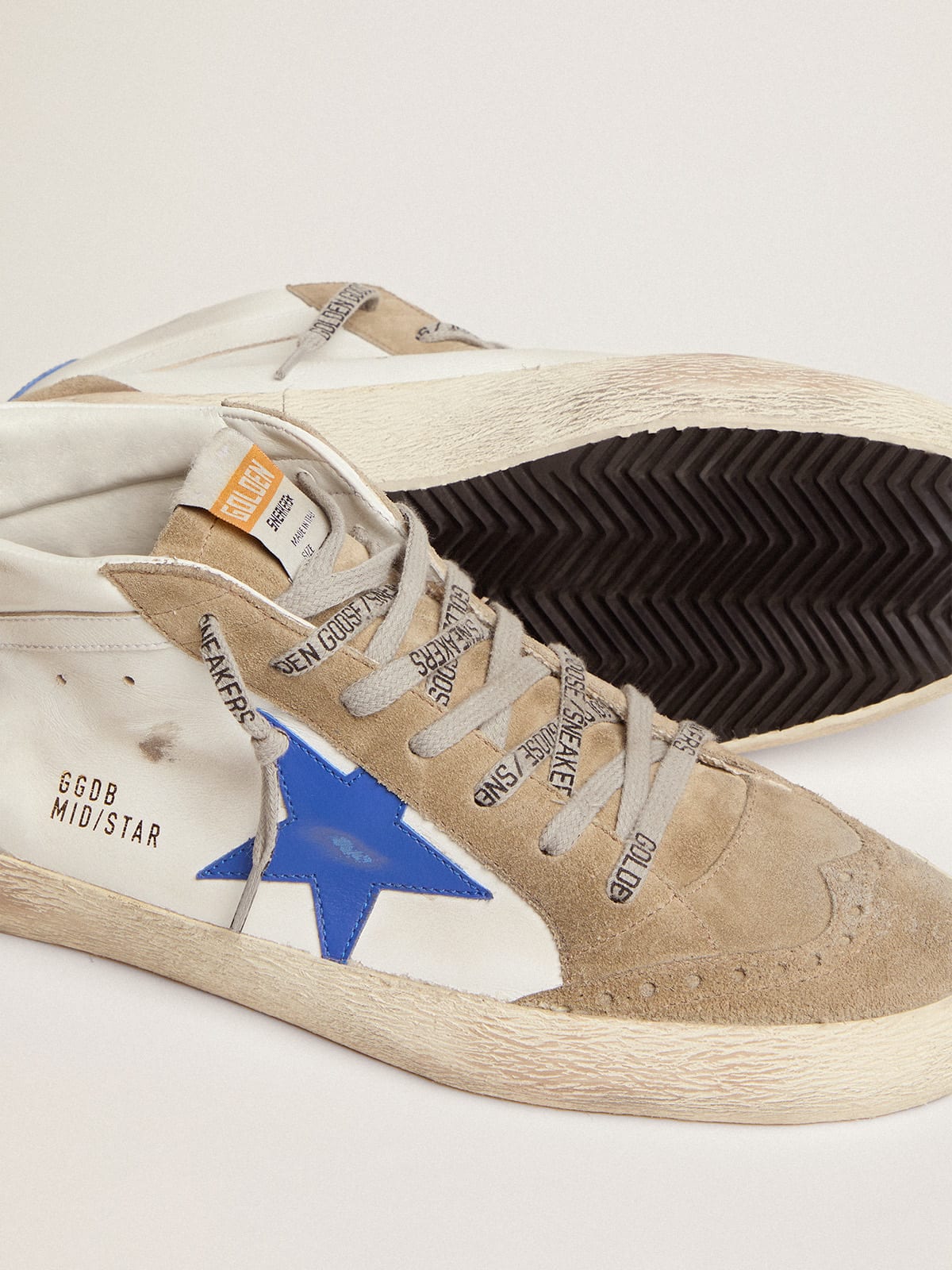 Mid Star in pelle bianca con stella blu e inserti color tortora