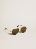 Aviator sunglasses with silver frame and green lenses