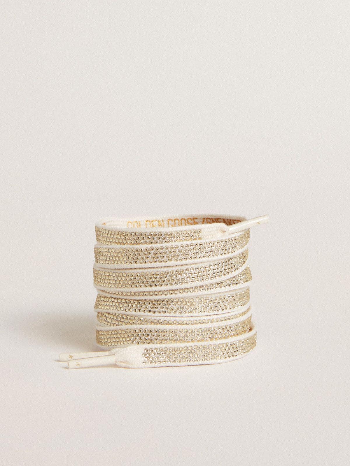 Cotton laces with silver Swarovski crystals and gold-colored logo