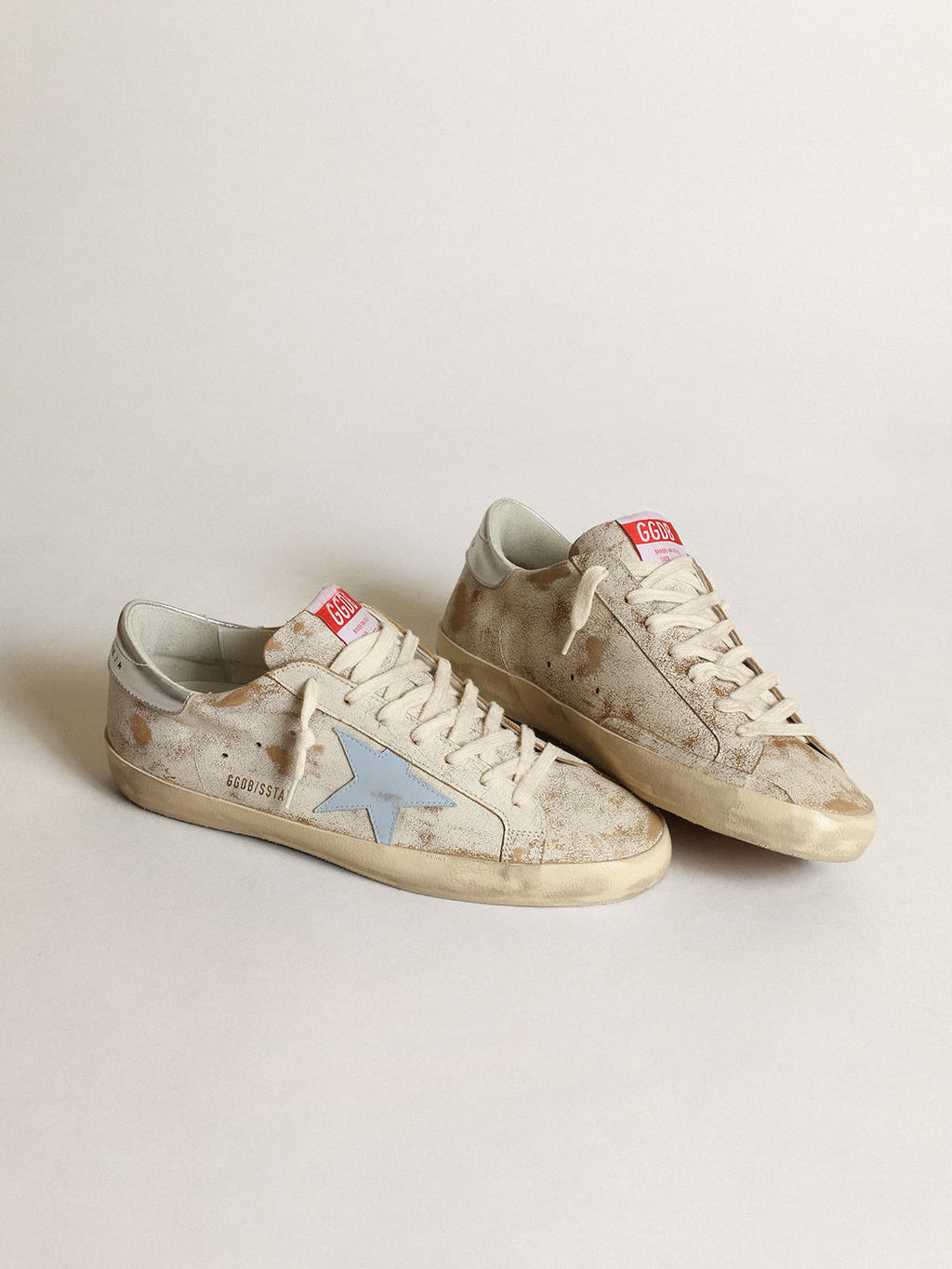 Sneaker Super-Star uomo con stella in pelle azzurro fumé e talloncino in pelle laminata color argento