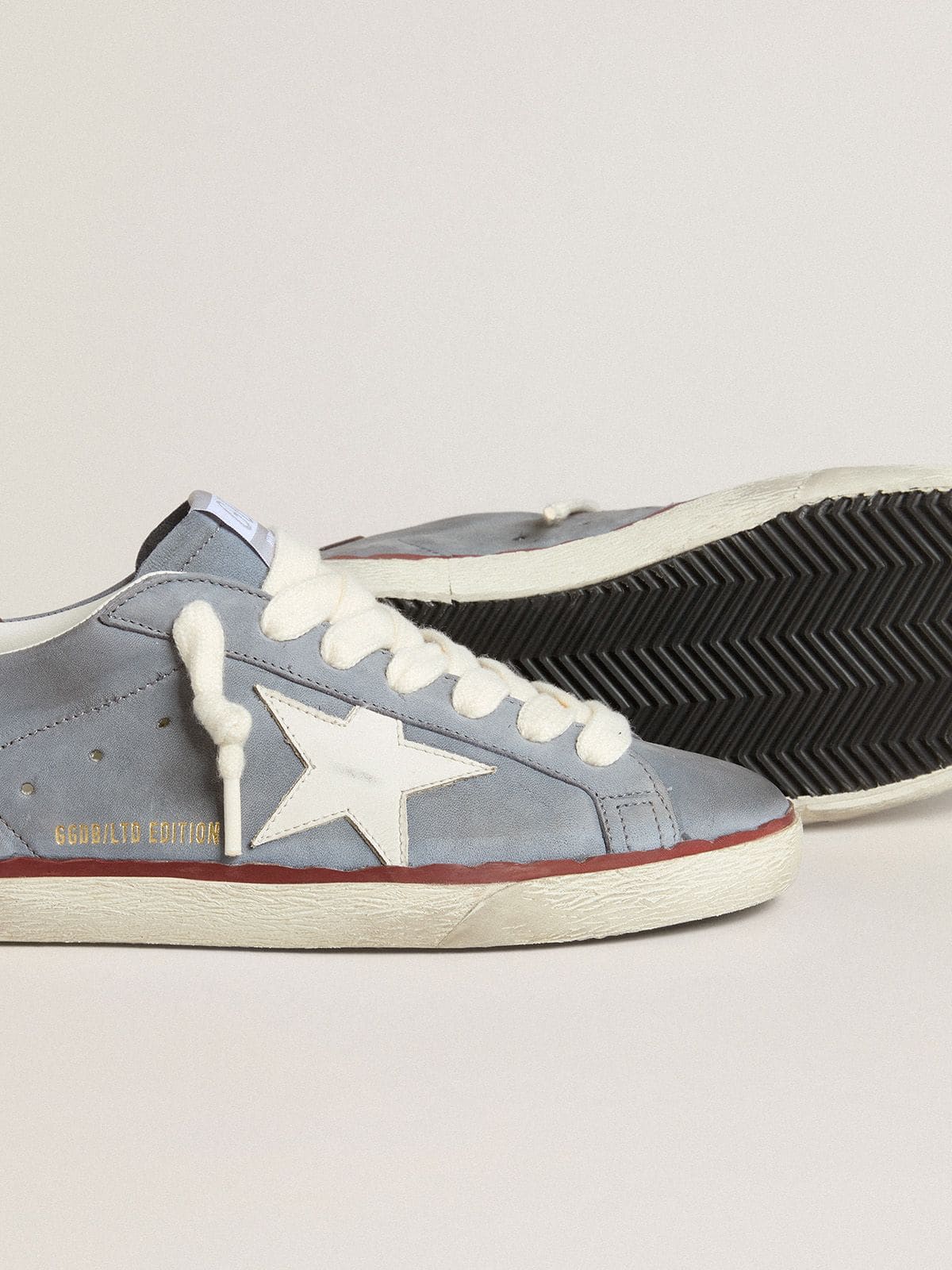 Super-Star LTD in light blue nubuck leather with white leather star and brown leather heel tab