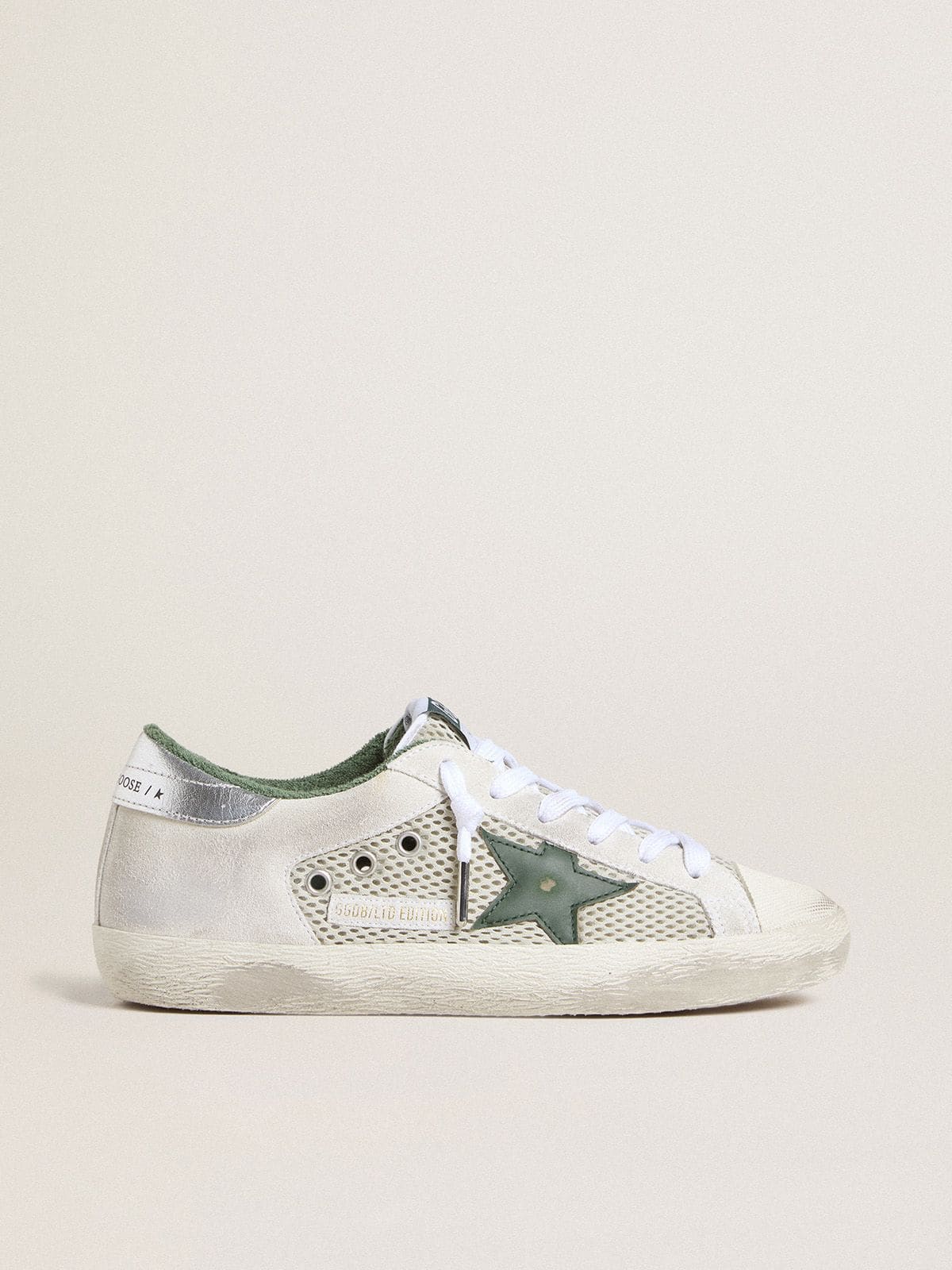 Women’s Super-Star LTD in white suede and mesh with green leather star and silver foiled leather heel tab