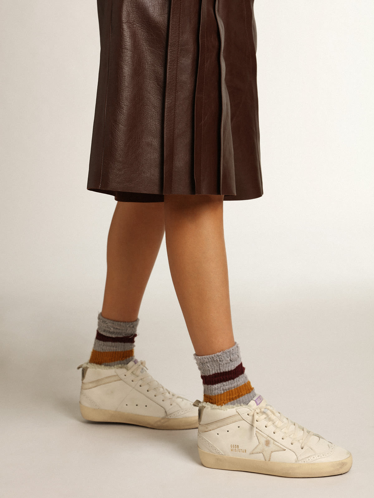 Mid Star in nappa con stella e virgola in pelle lucida bianca