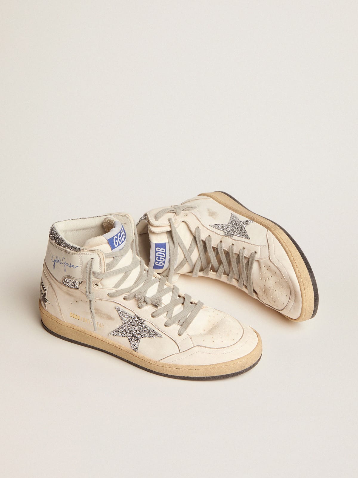 Sneaker Sky-Star con firma sulla caviglia e inserti in glitter argento