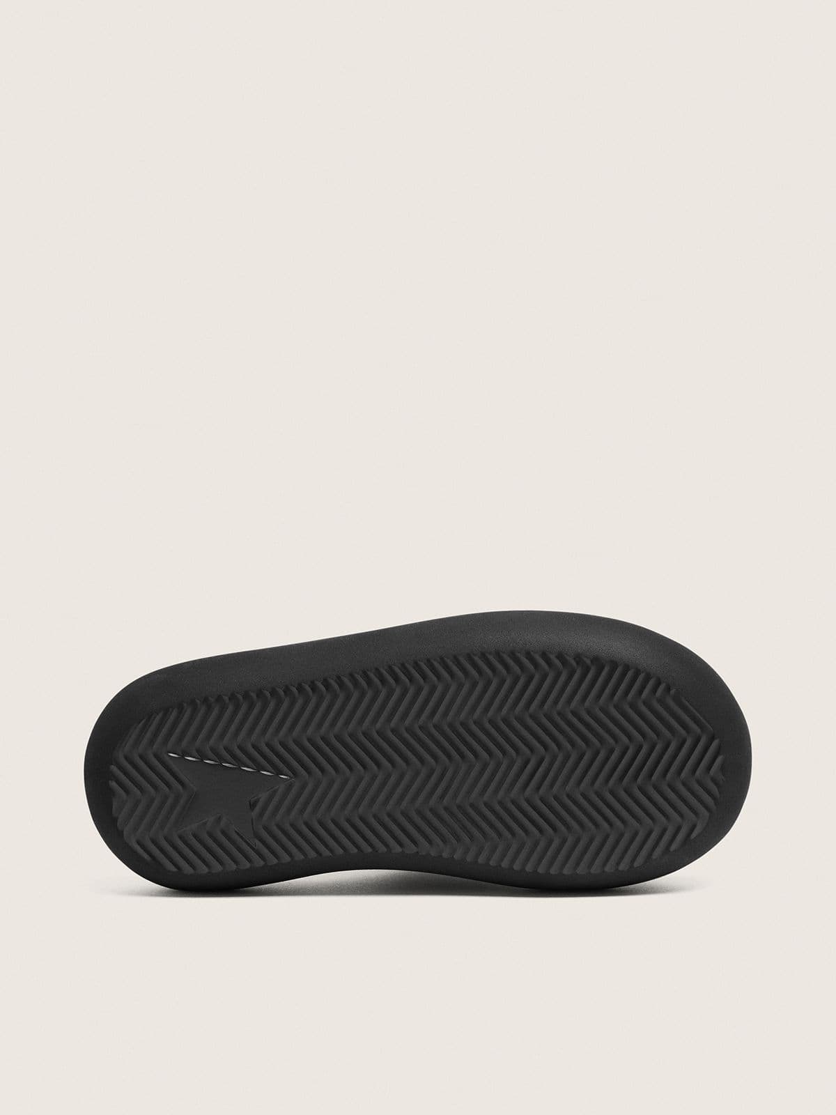 Women's Space-Star Slide slip-ons in black leather
