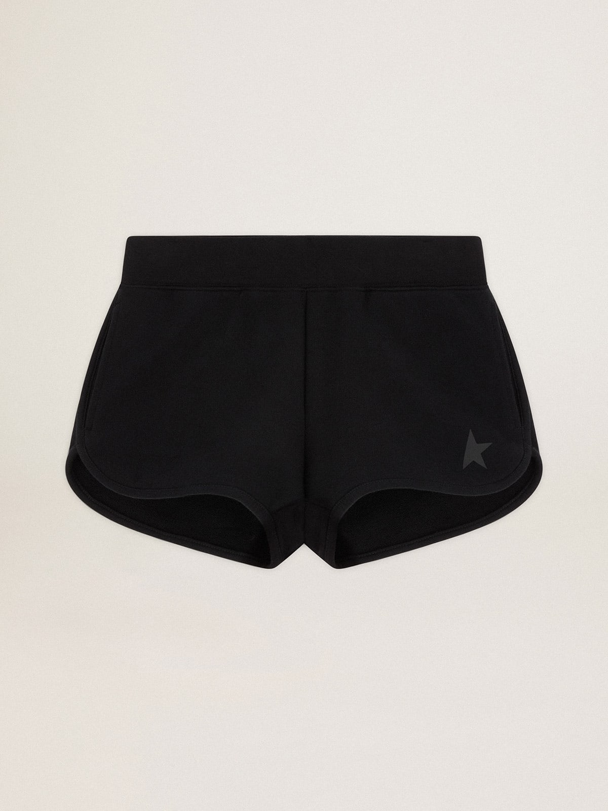 Pantaloncini di colore nero con stella ton sur ton sul davanti