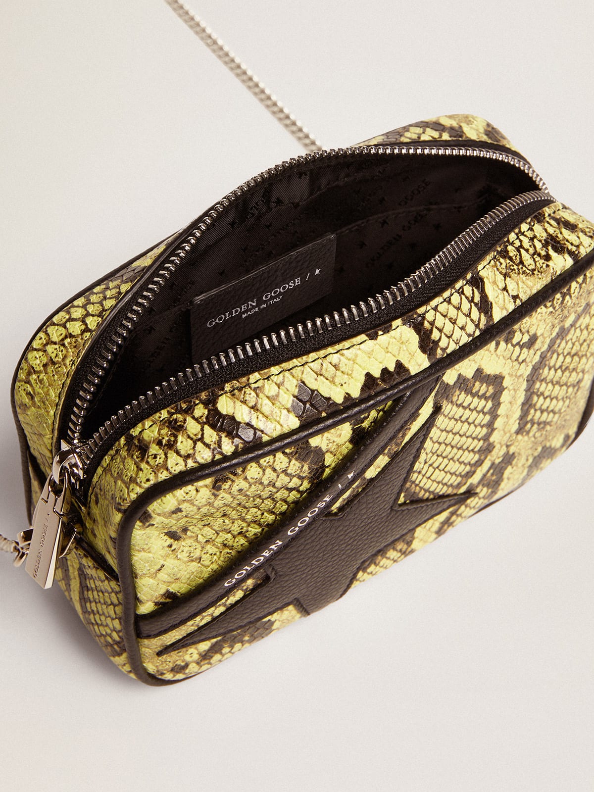 Borsa Mini Star Bag in pelle con stampa pitonata color lime e stella in pelle nera