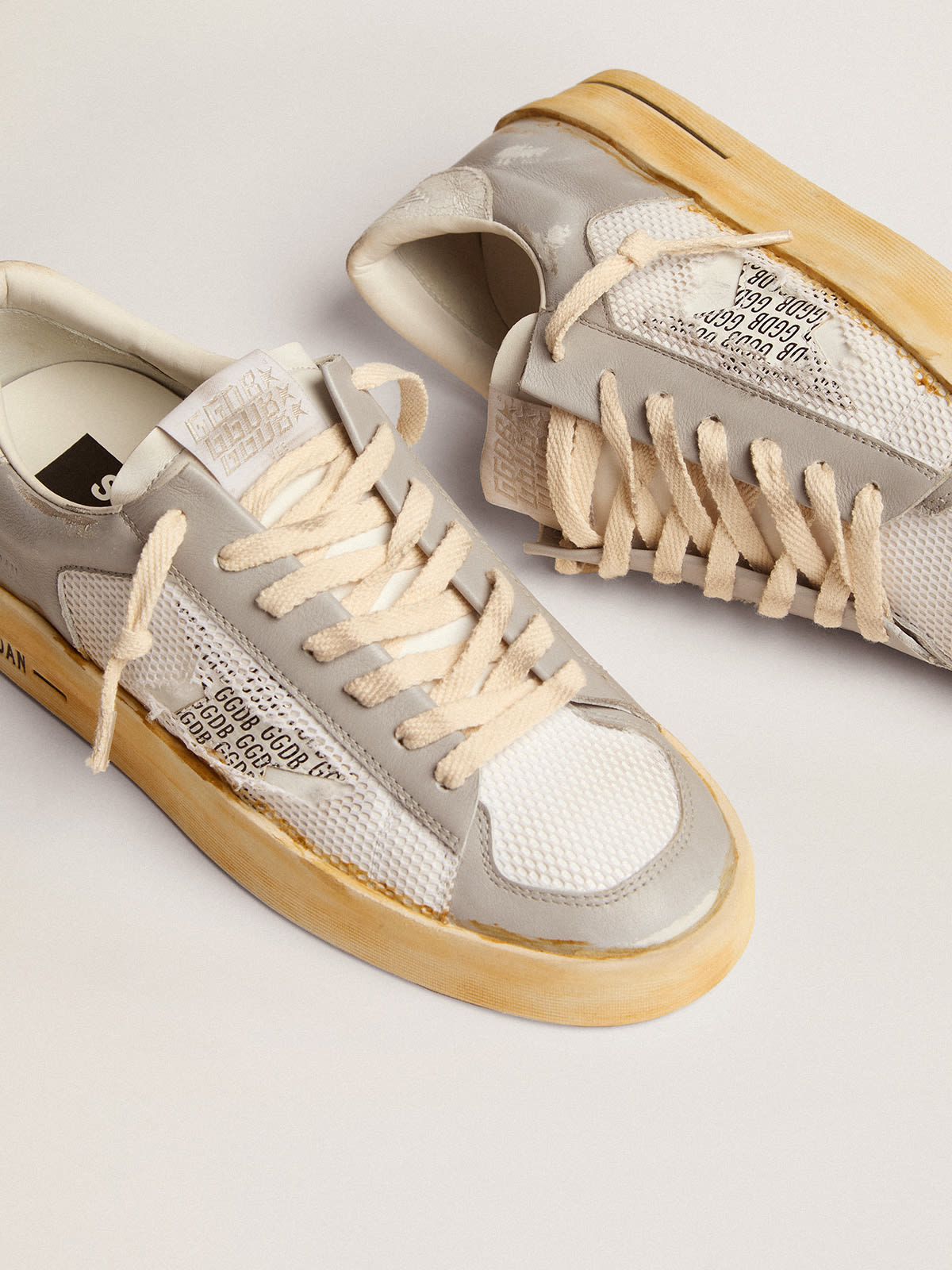 Sneaker Stardan con stella in pelle bianca con stampa GGDB e talloncino in pelle bianca cracklé