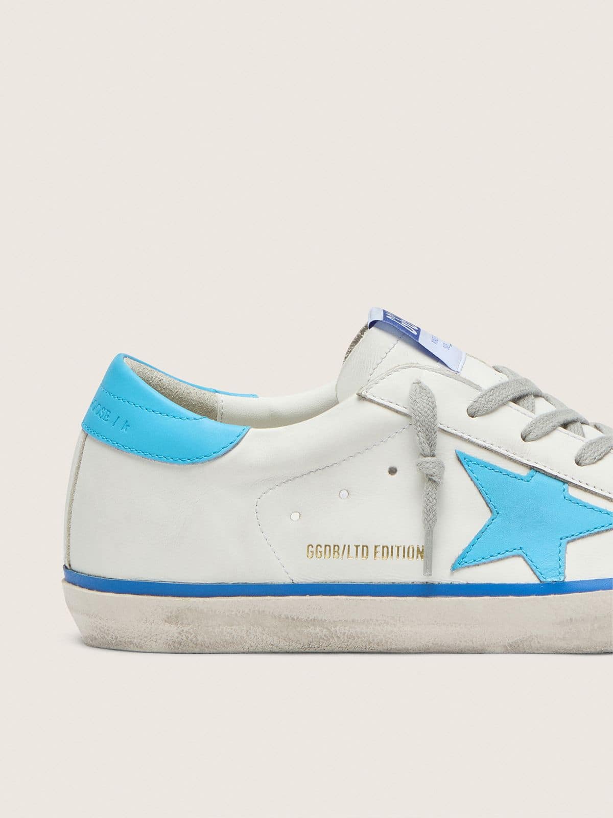 Women's Super-Star LTD in white leather with light blue leather star and heel tab