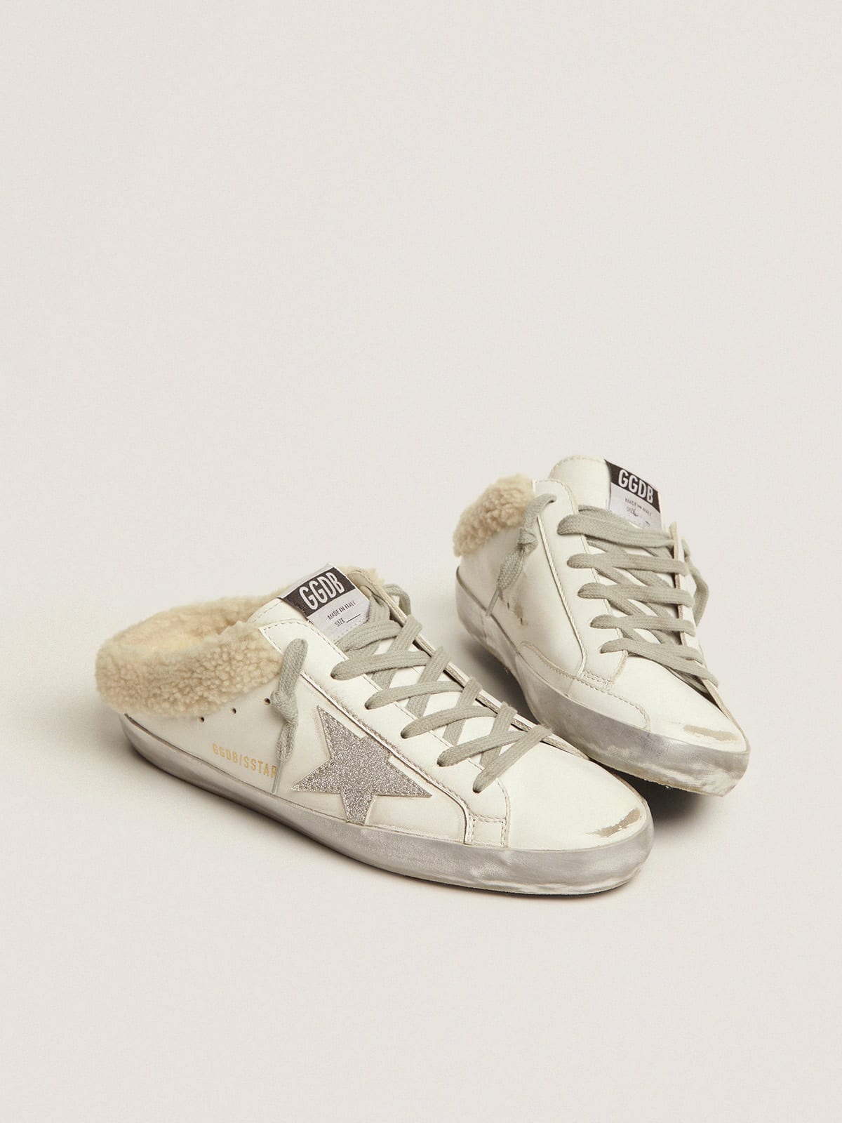 Super-Star Sabot in pelle bianca e fodera in shearling